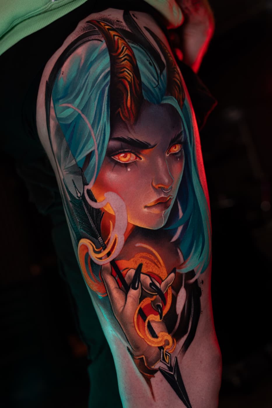 Colour portrait tattoo with hand detail, teal and orange tones
